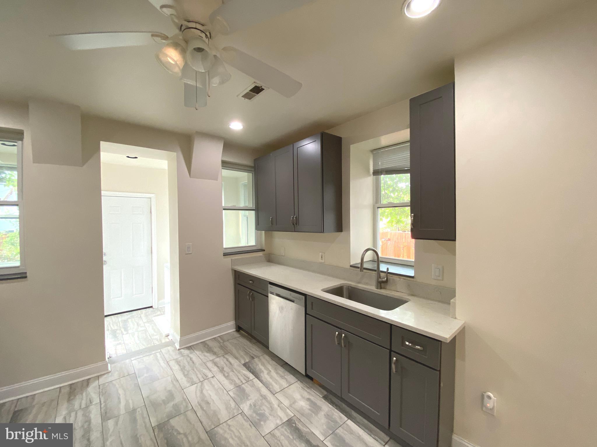 75 New York Avenue Northwest Washington, DC 20001 - Photo 20 of 32 a bathroom with a sink double vanity and a mirror