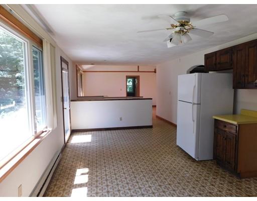 33 Bay Path Road Charlton, MA 01507 - Photo 4 of 19 a view of a kitchen with a refrigerator cabinets and a sink