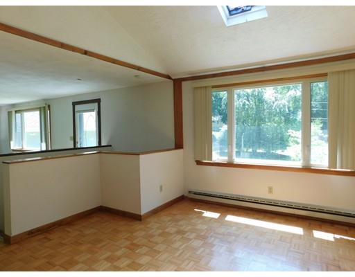 33 Bay Path Road Charlton, MA 01507 - Photo 5 of 19 a view of an empty room with a window