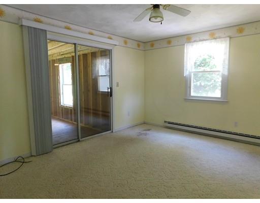 33 Bay Path Road Charlton, MA 01507 - Photo 10 of 19 a view of an empty room with a window