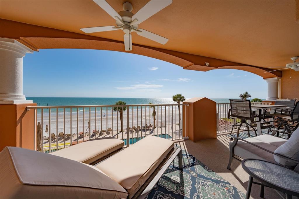 16326 Gulf Boulevard, Unit 206 Redington Beach, FL 33708 - Photo 1 of 42 a view of a patio with a table and chairs