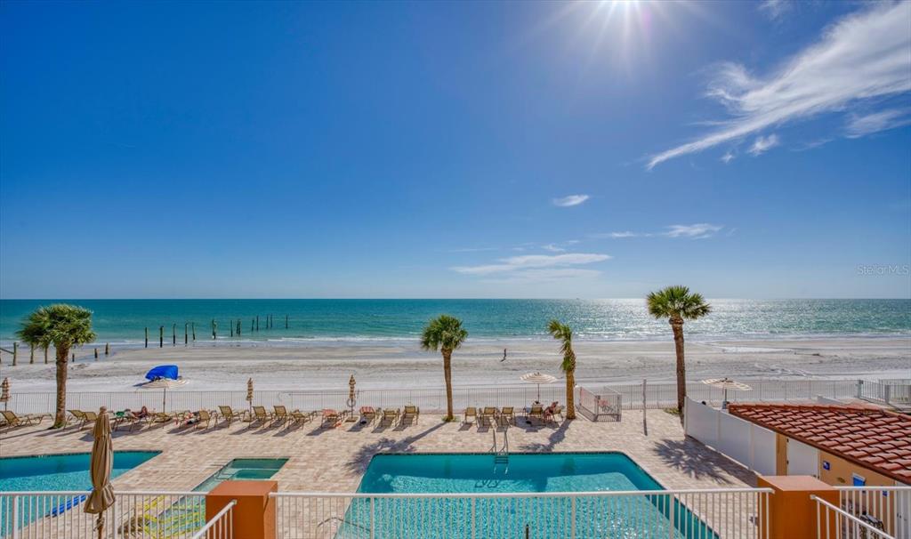 16326 Gulf Boulevard, Unit 206 Redington Beach, FL 33708 - Photo 3 of 42 a view of swimming pool with seating area
