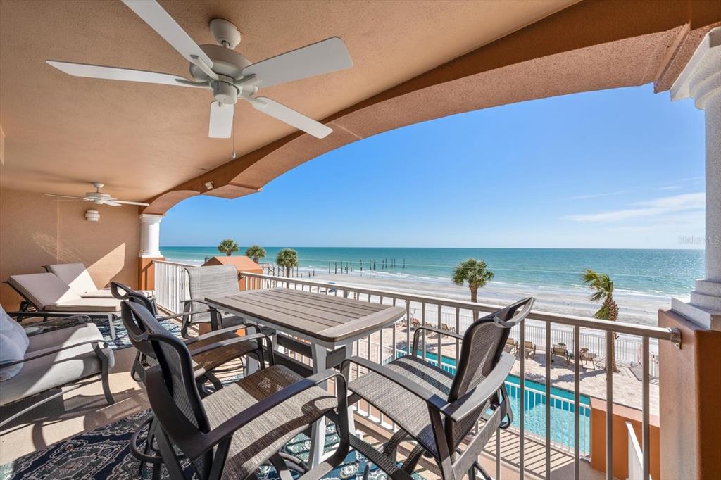 16326 Gulf Boulevard, Unit 206 Redington Beach, FL 33708 - Photo 6 of 42 a view of an outside dining space with furniture