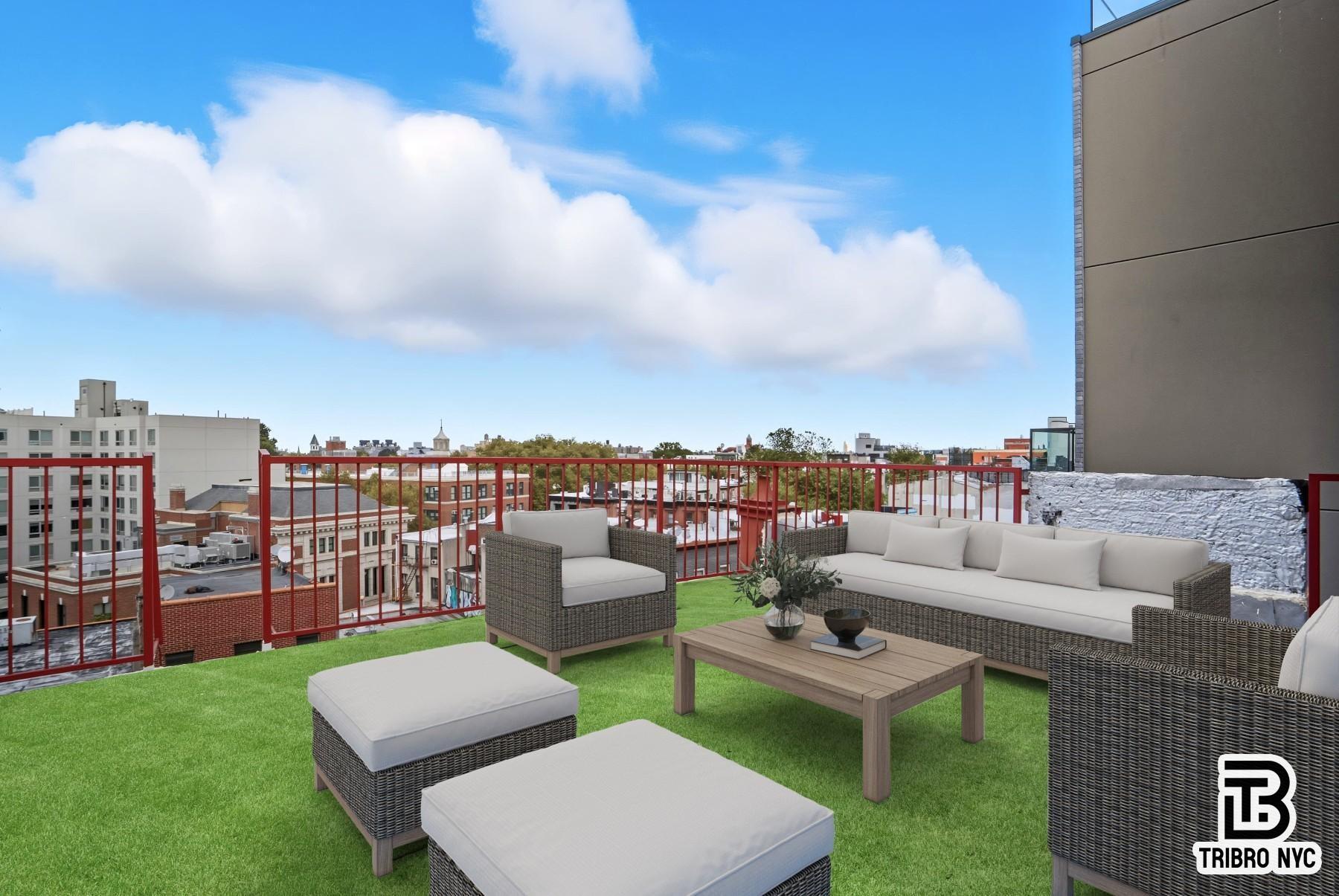 a view of a patio with couches and a table and chairs