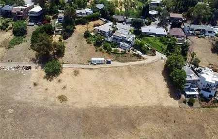 a view of a garden with a fountain