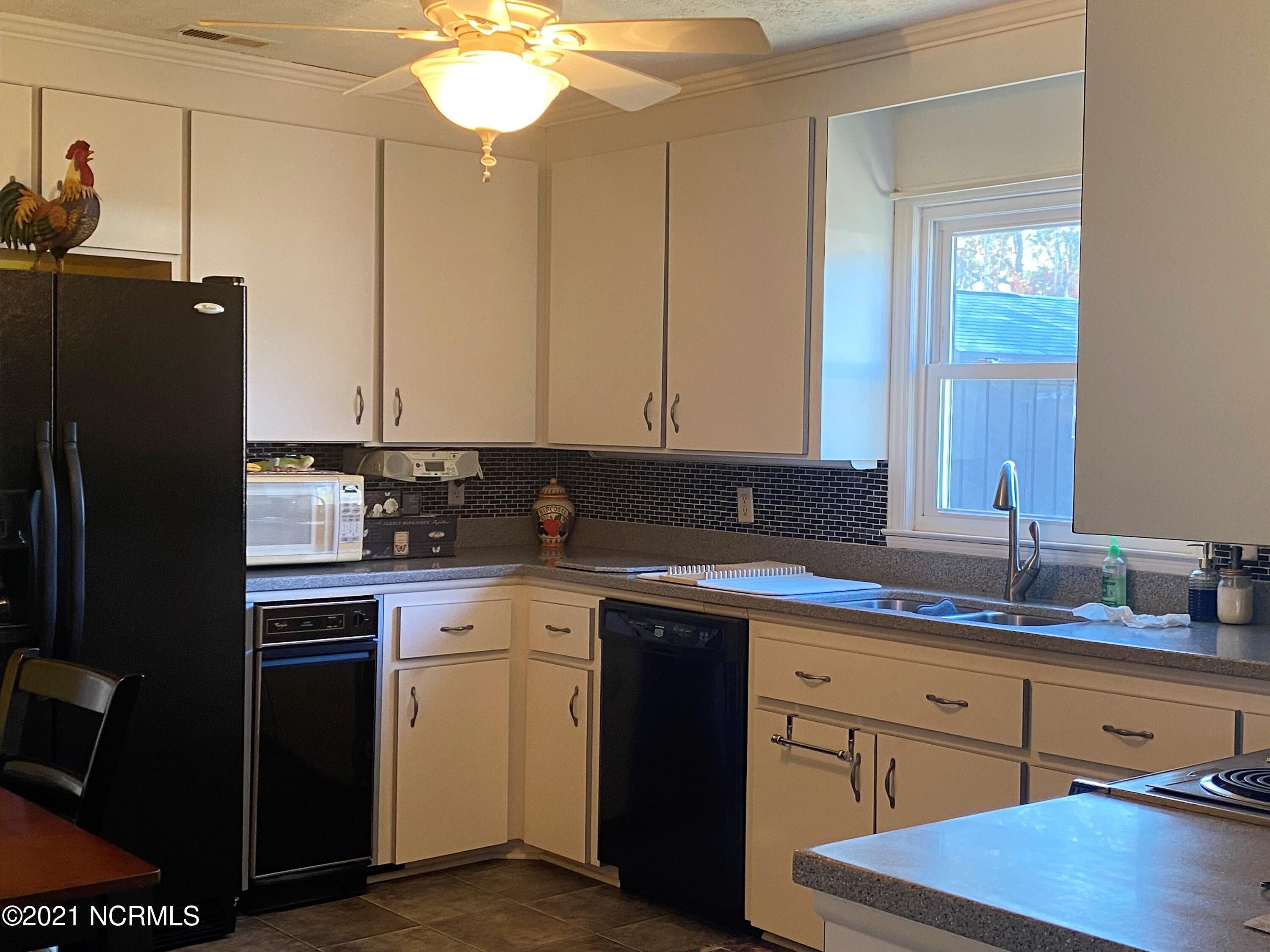 3618 Country Club Road Morehead City, NC 28557 - Photo 15 of 23 3618 kitchen frig 1