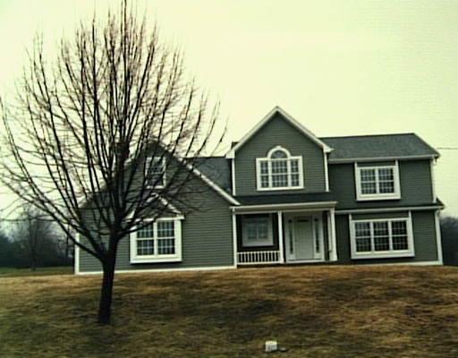 Lot35 Puritan Road Trumbull, CT 06611 - Photo 1 of 1 a front view of a house with a garden