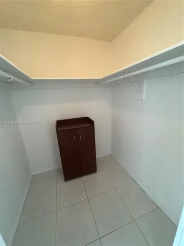 a bathroom with a bathtub and a toilet