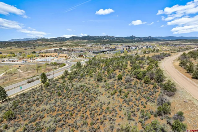 a view of an ocean and a mountain