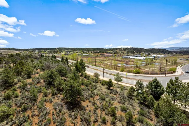 a view of a swimming pool with a balcony