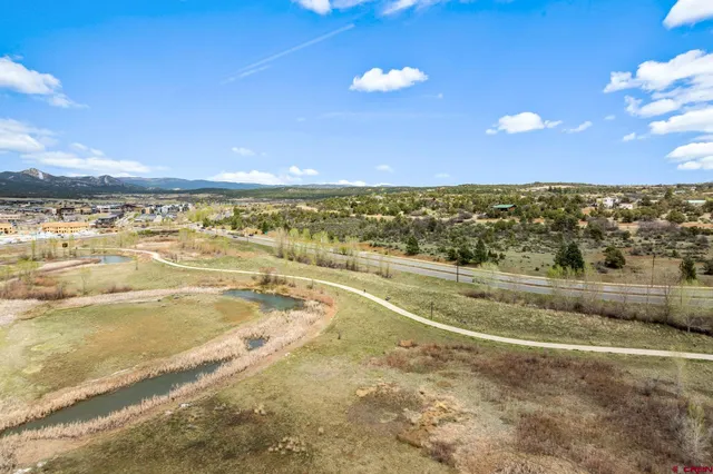 a view of a swimming pool with an ocean view