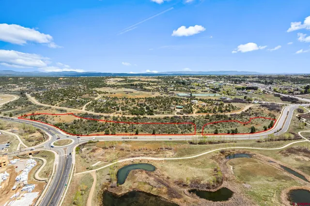 a view of a swimming pool with a lake view