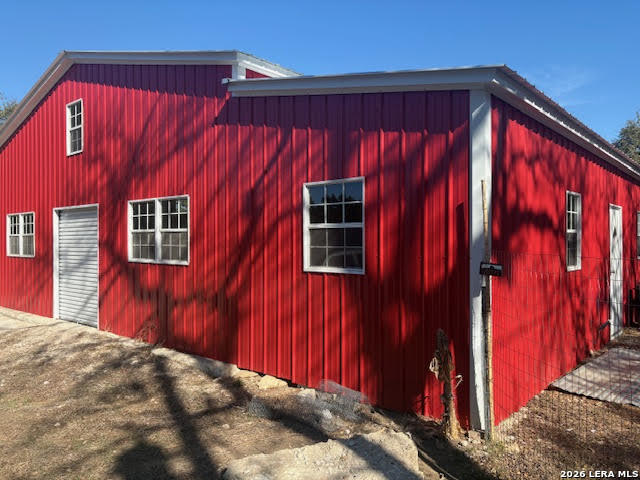254 Jolie Drive Spring Branch, TX 78070 - Photo 8 of 16 a view of a house with a backyard