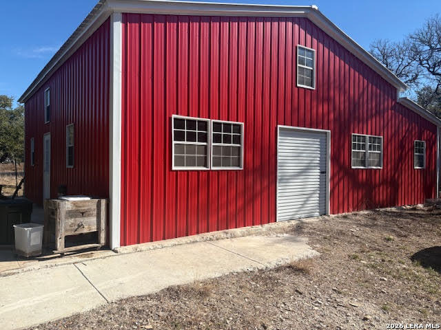 254 Jolie Drive Spring Branch, TX 78070 - Photo 9 of 16 a view of a house with a backyard