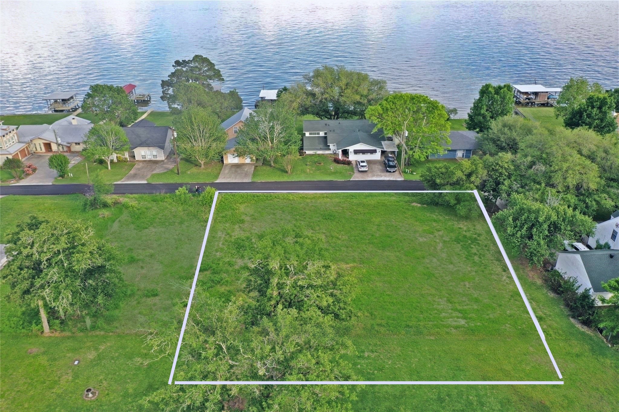 Lot 25-26 Lake Cir Point Point Blank, TX 77364 - Photo 2 of 6 a view of yard with green space