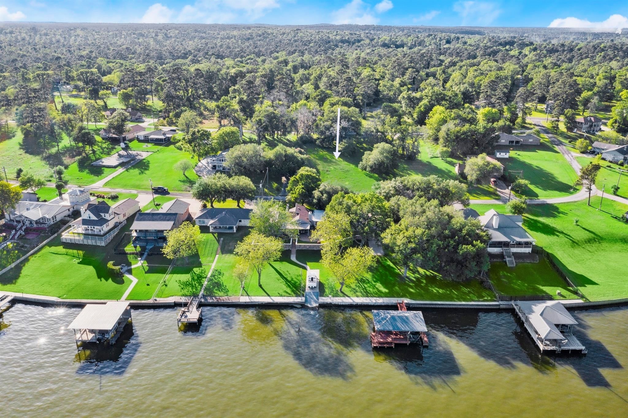 Lot 25-26 Lake Cir Point Point Blank, TX 77364 - Photo 6 of 6 an aerial view of a house with a yard lake view