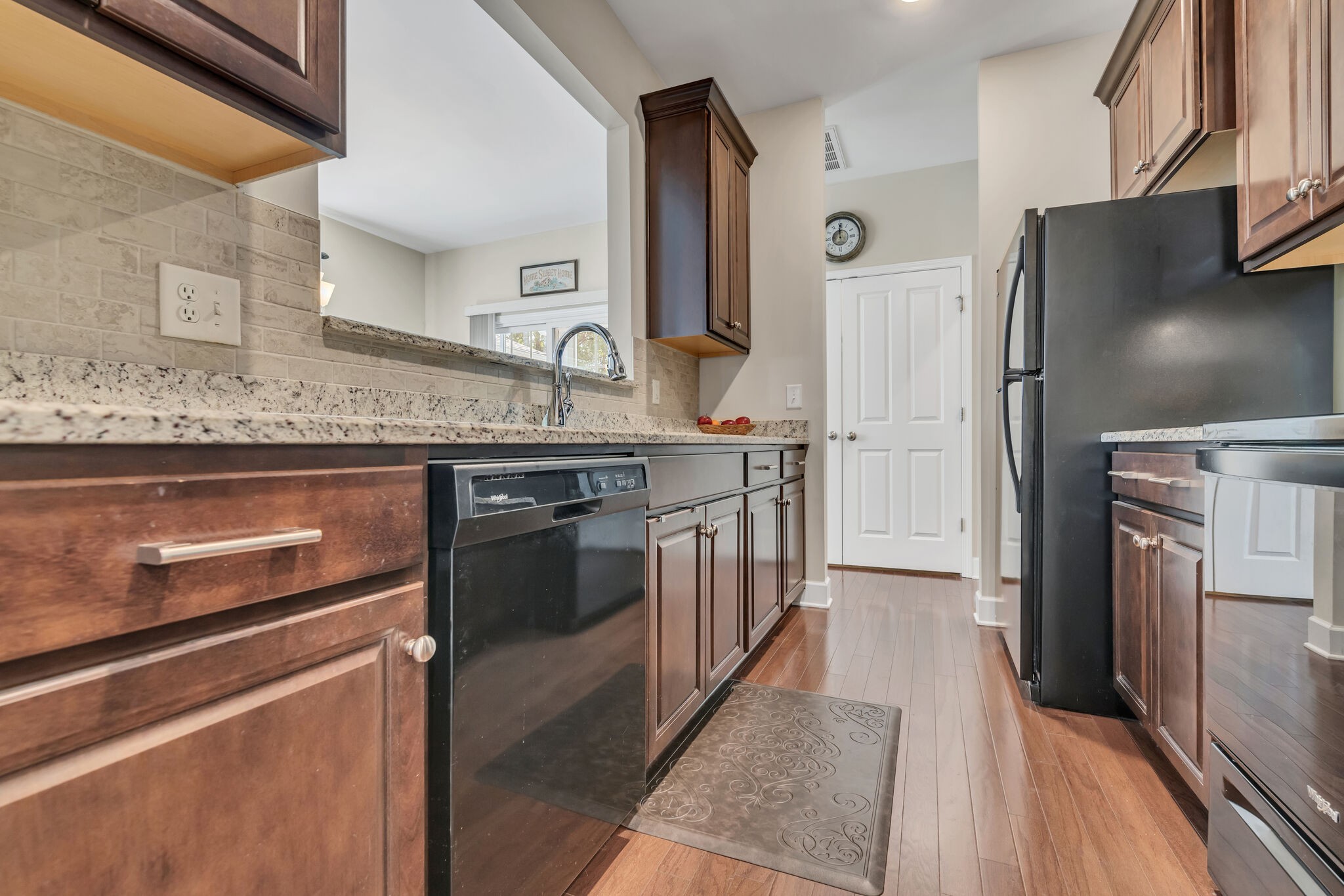 2218 Rigden Mill Drive Smyrna, TN 37167 - Photo 15 of 32 a kitchen with stainless steel appliances granite countertop a stove and a refrigerator