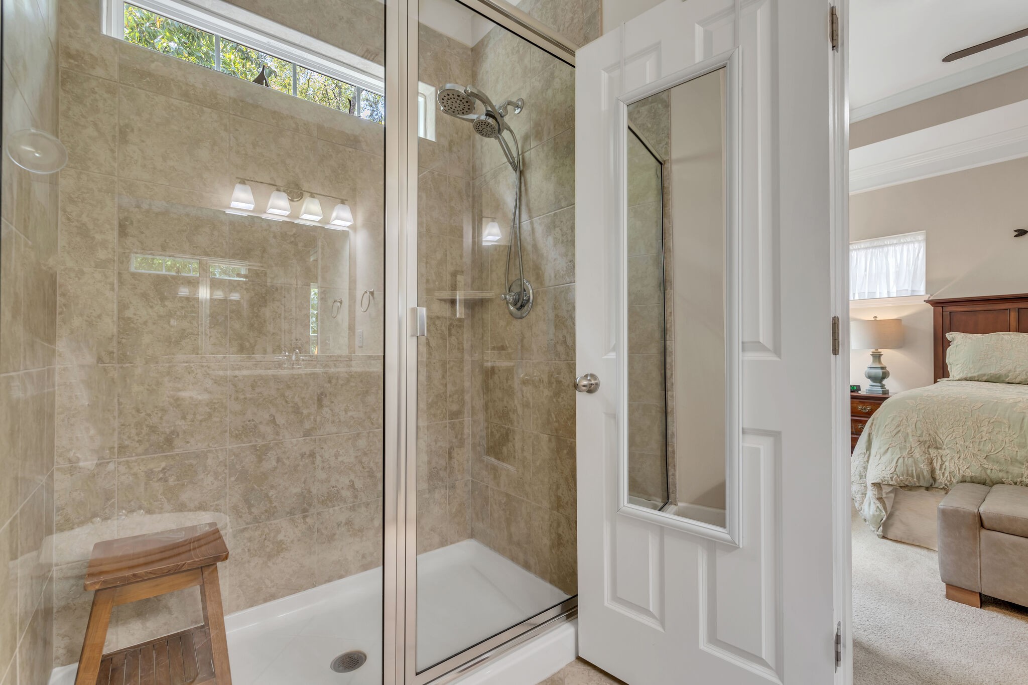 2218 Rigden Mill Drive Smyrna, TN 37167 - Photo 21 of 32 a bathroom with a glass shower door