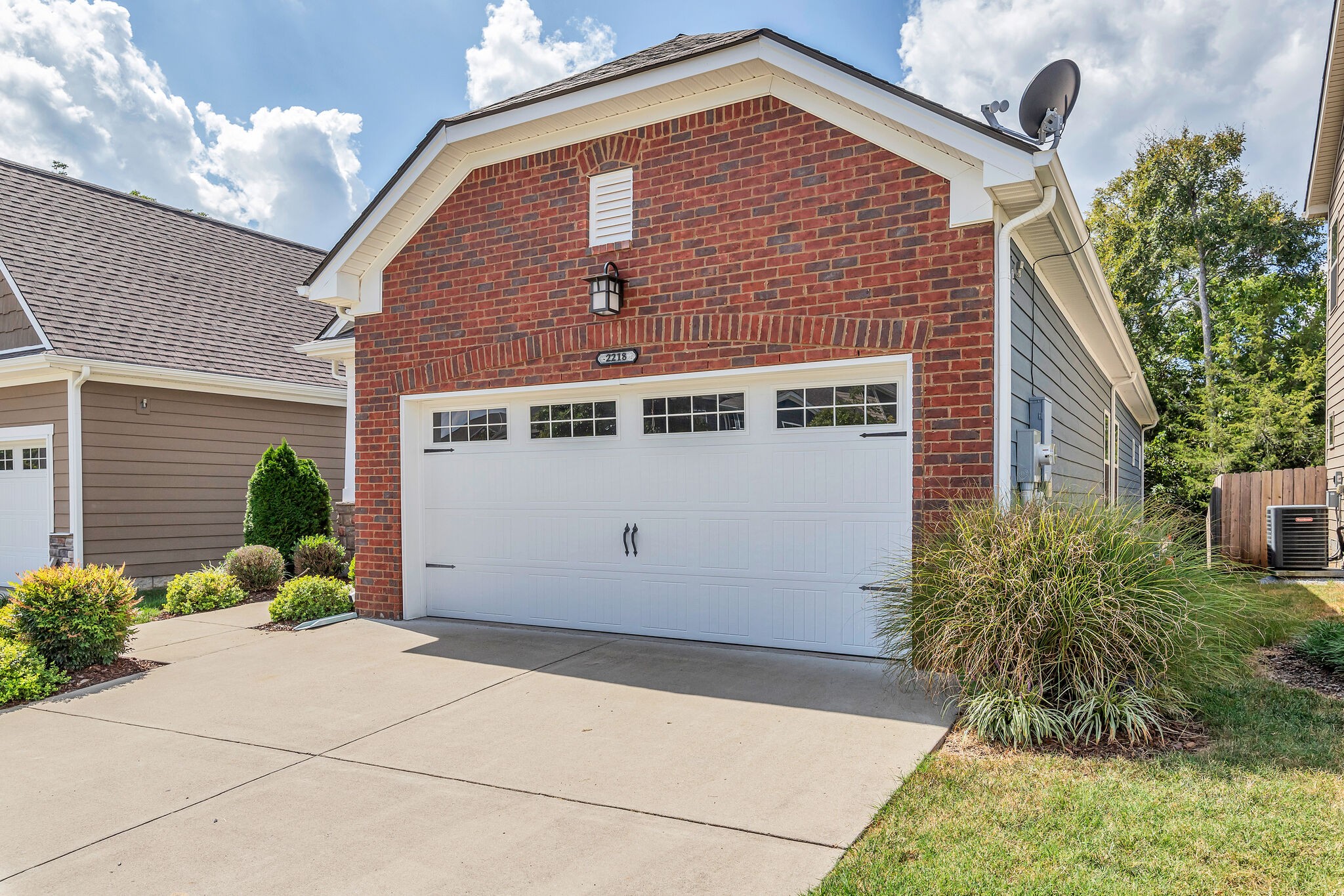 2218 Rigden Mill Drive Smyrna, TN 37167 - Photo 3 of 32 a front view of a house with garden
