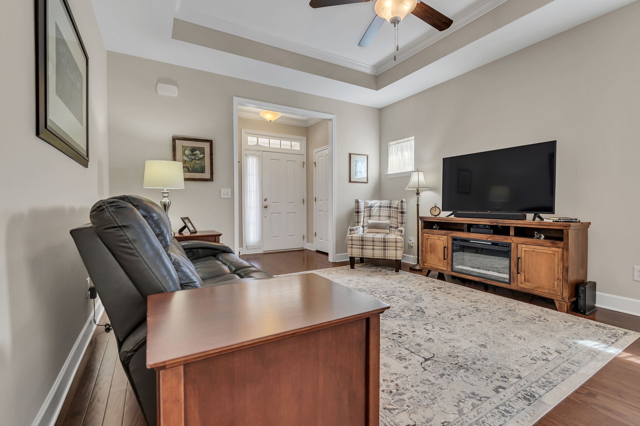 2218 Rigden Mill Drive Smyrna, TN 37167 - Photo 8 of 32 a living room with furniture and a flat screen tv
