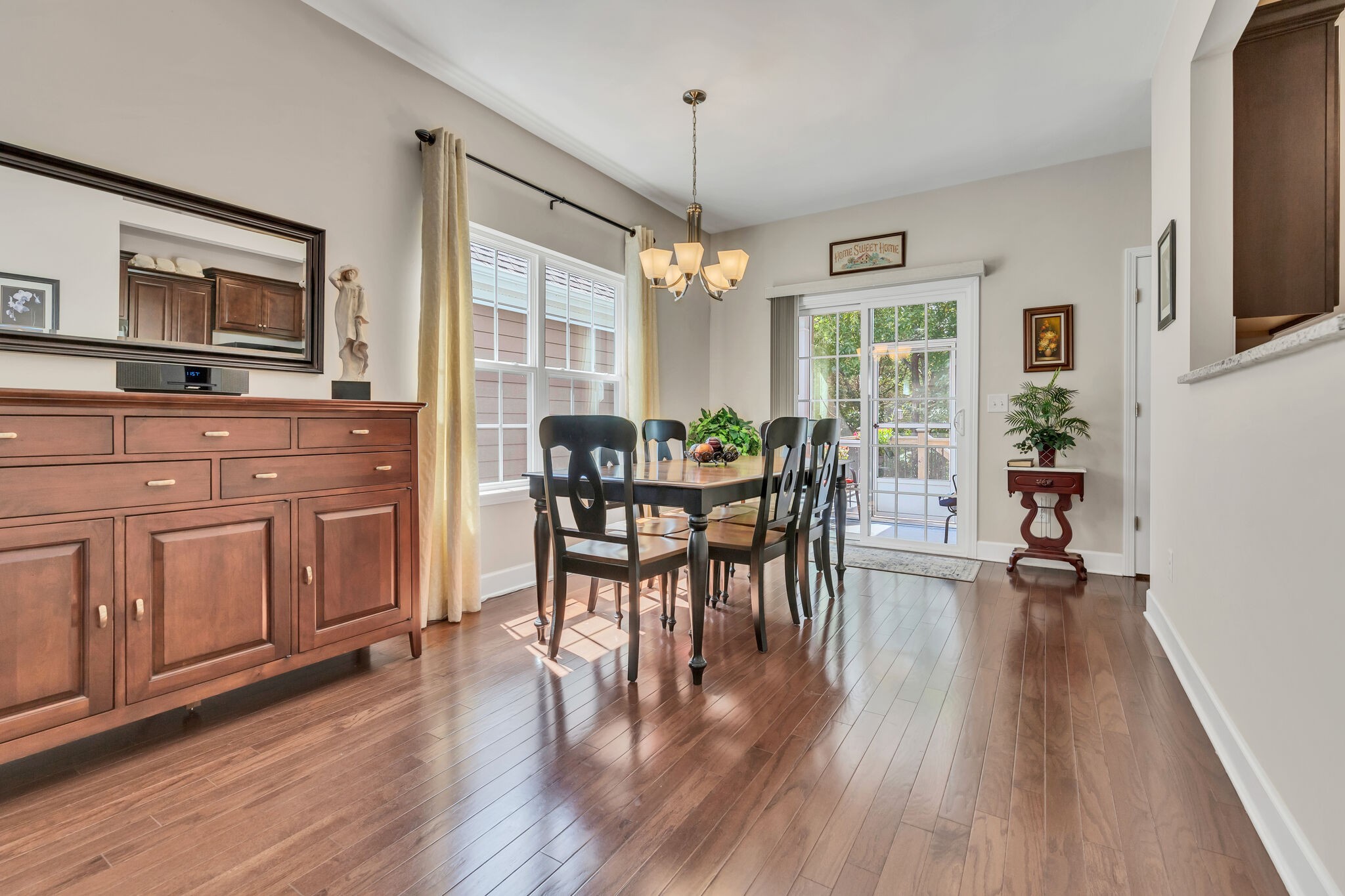 2218 Rigden Mill Drive Smyrna, TN 37167 - Photo 9 of 32 a view of a dining room with furniture window and wooden floor