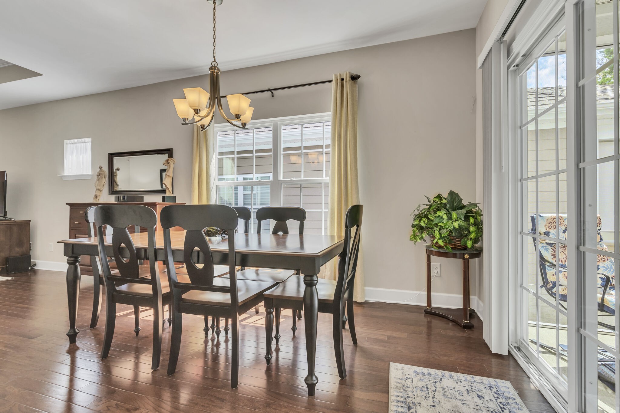 2218 Rigden Mill Drive Smyrna, TN 37167 - Photo 10 of 32 a view of a dining room with furniture window and wooden floor