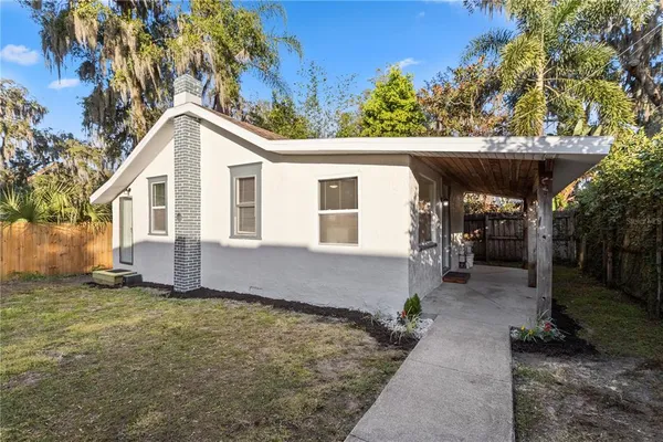 a house view with a outdoor space