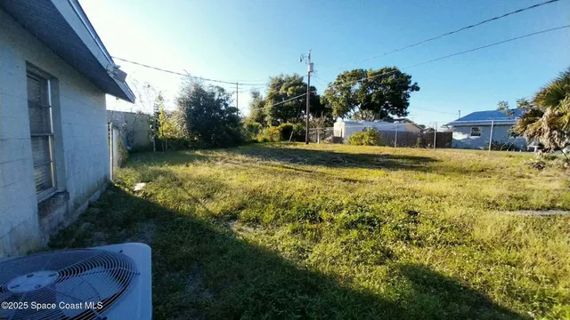 a view of a swimming pool with an outdoor space and seating area