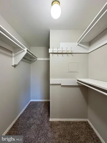 a view of a room with racks on the wall