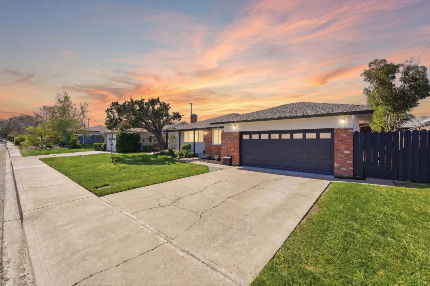 774 Ridge Rd. Santa Clara, CA 95051 - Photo 2 of 50 a view of a house with a yard
