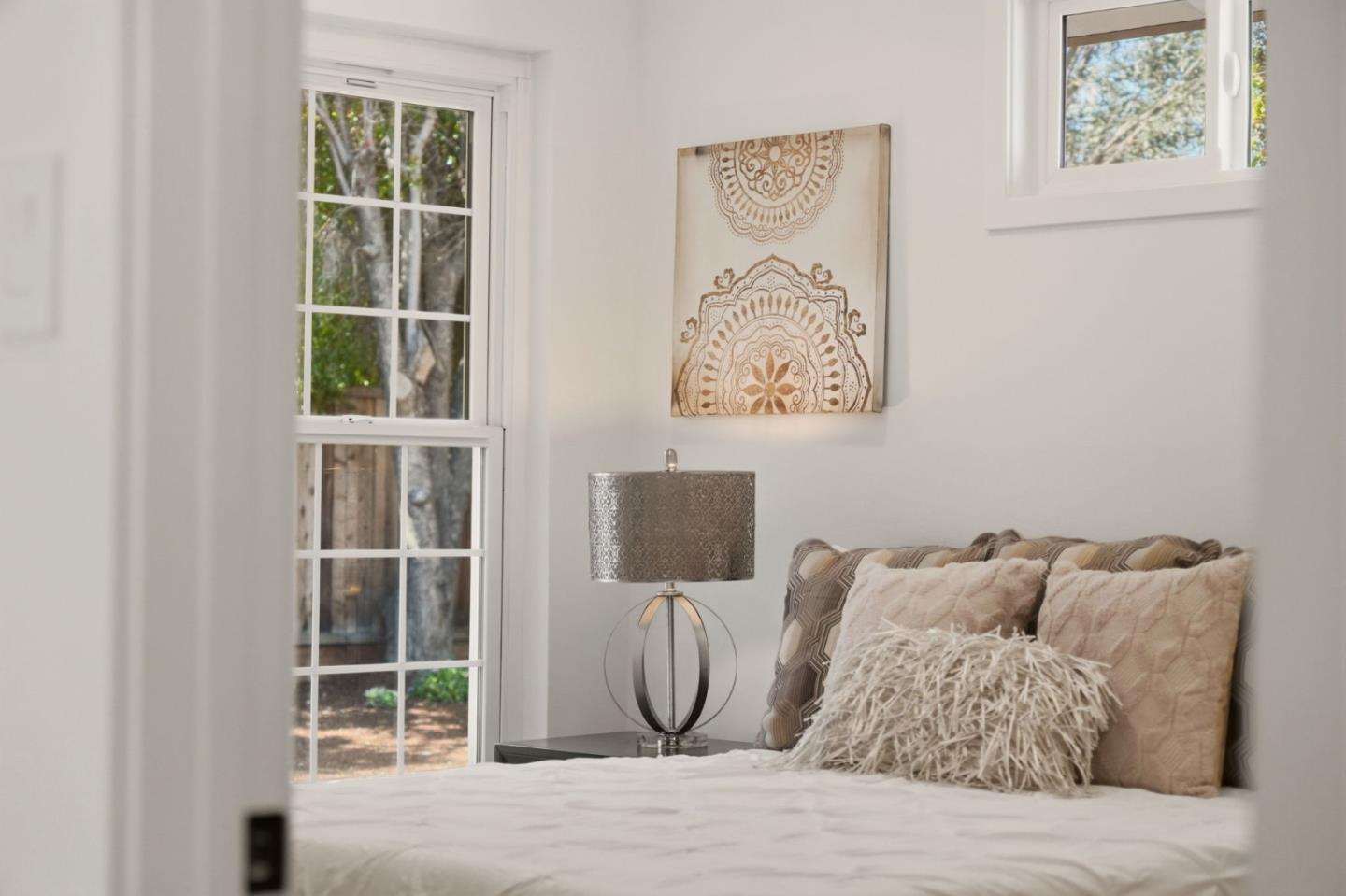 774 Ridge Rd. Santa Clara, CA 95051 - Photo 24 of 50 a bed room with a bed and a window