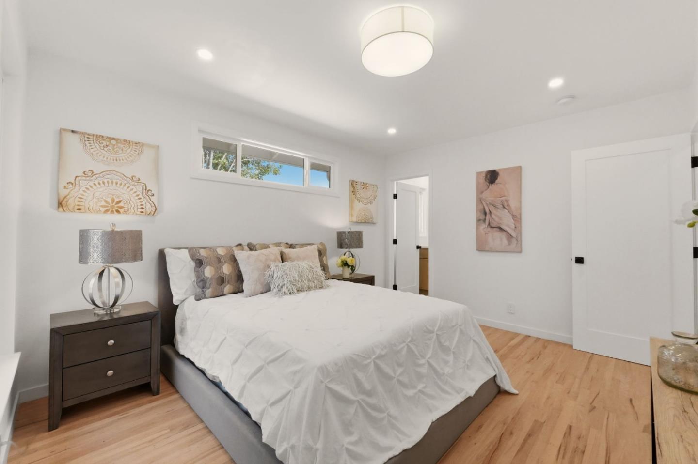 774 Ridge Rd. Santa Clara, CA 95051 - Photo 26 of 50 a spacious bedroom with a bed and a desk