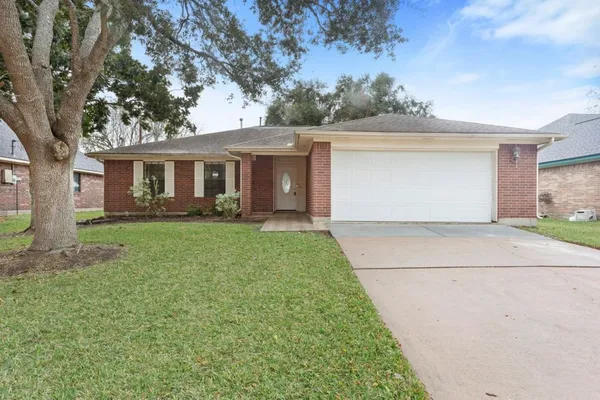 front view of house with a yard