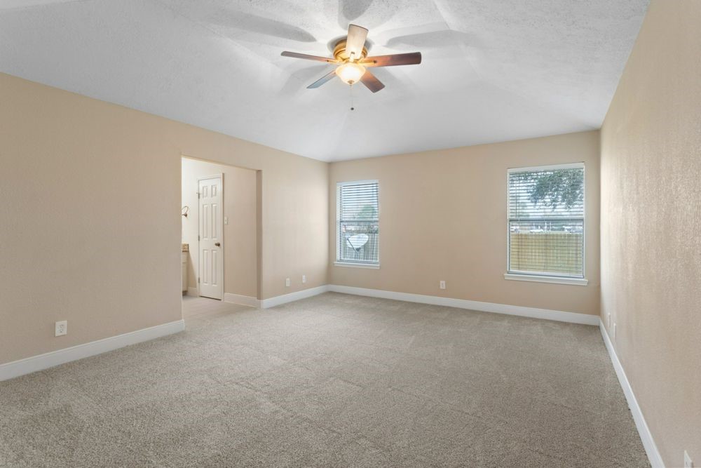 509 Teal Drive Dickinson, TX 77539 - Photo 9 of 23 a view of an empty room with a window