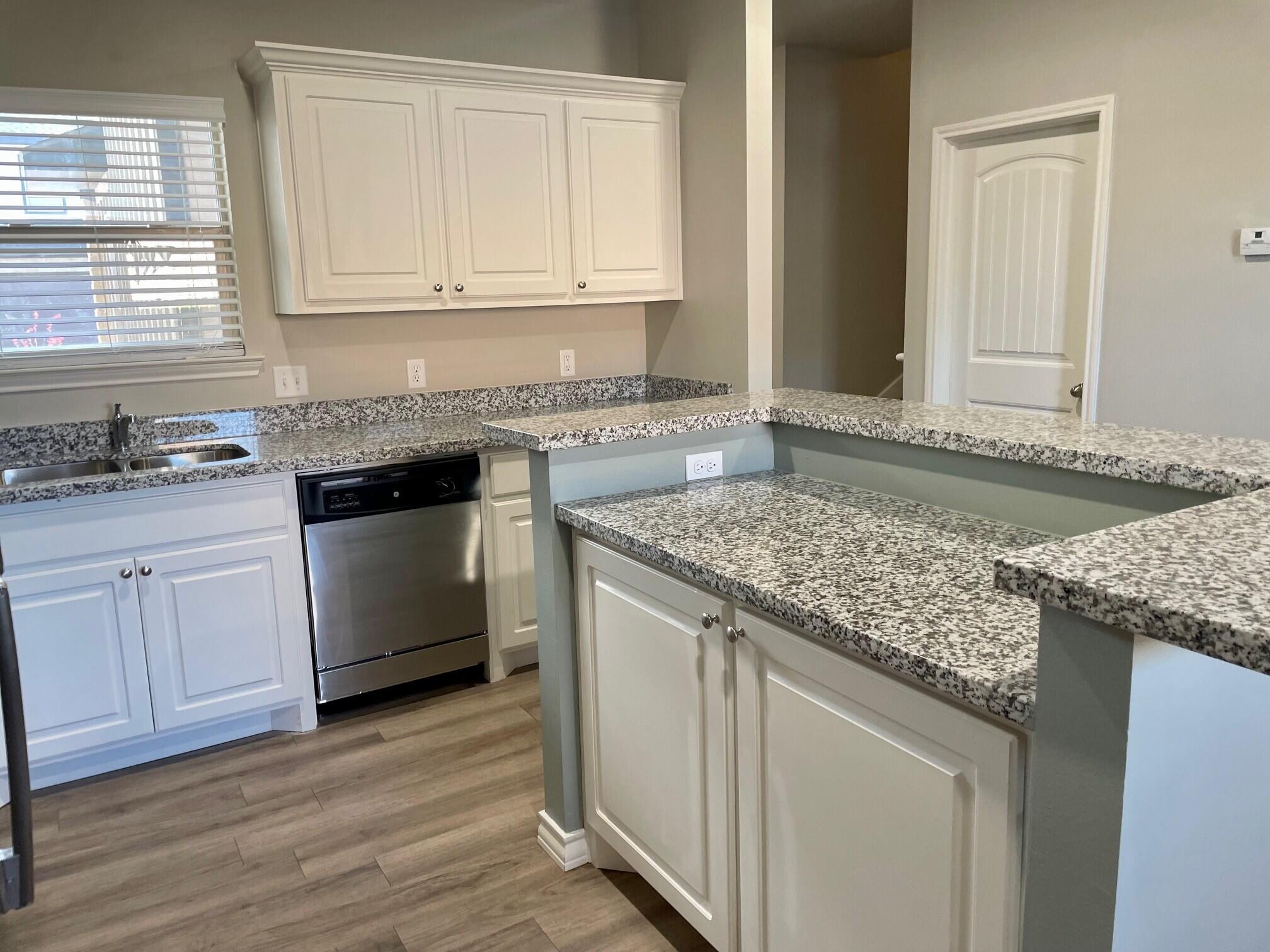 6040 24th Street, Unit 35 Lubbock, TX 79407 - Photo 9 of 16 Kitchen-Alt View