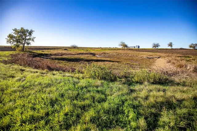 a view of a lake with a city
