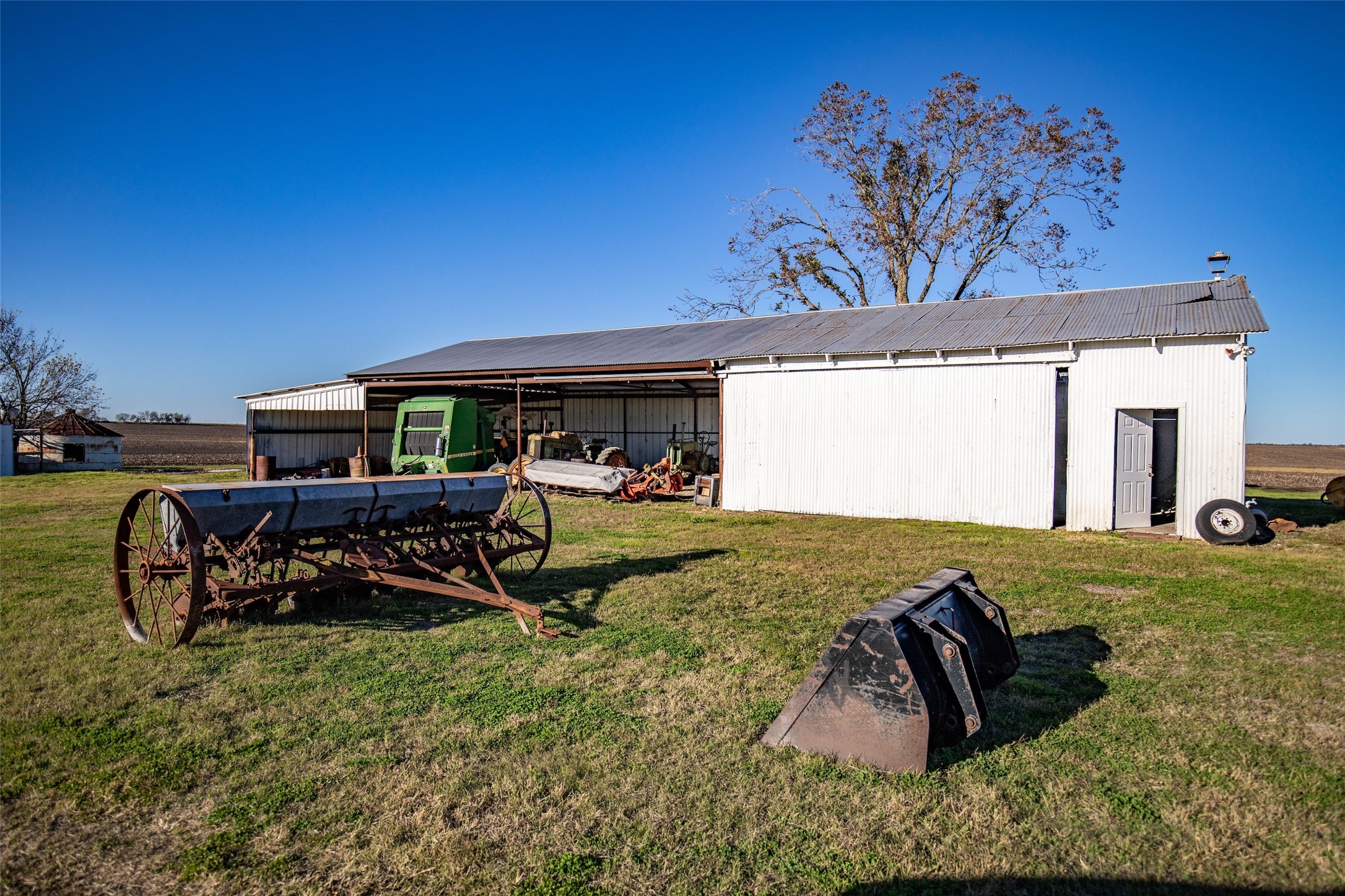 14914 Svenska Road Coupland, TX 78615 - Photo 24 of 24 a bed room with a bed and a chair