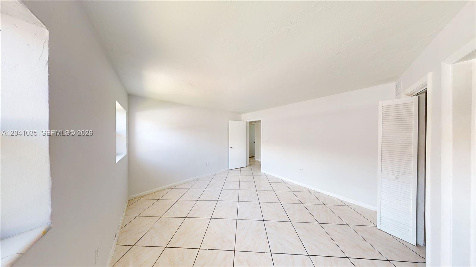 6811 Southwest 16th Street Miami, FL 33144 - Photo 15 of 21 a view of an empty room