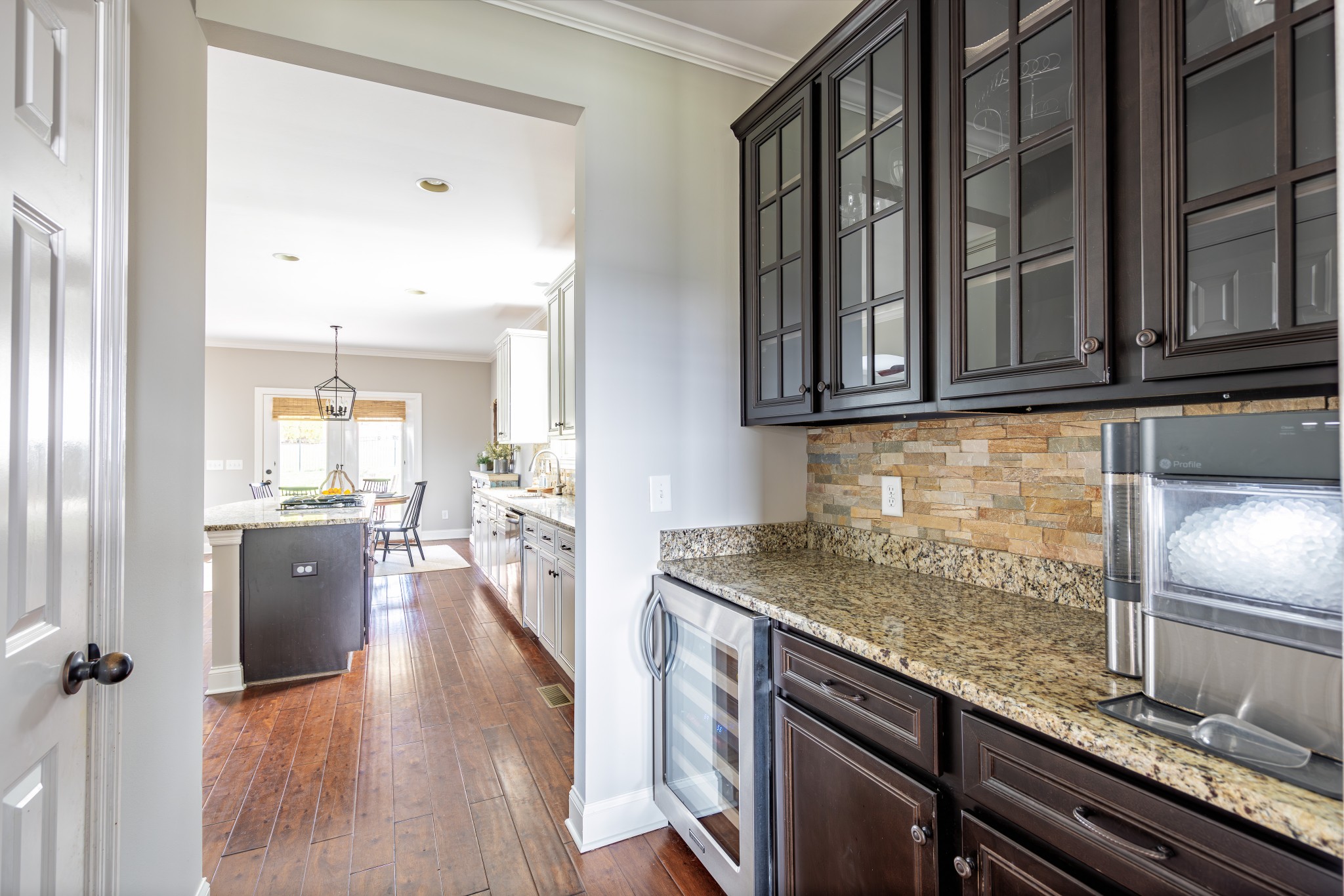 165 Chester Stevens Road Franklin, TN 37067 - Photo 5 of 25 a kitchen with stainless steel appliances granite countertop a sink stove and cabinets