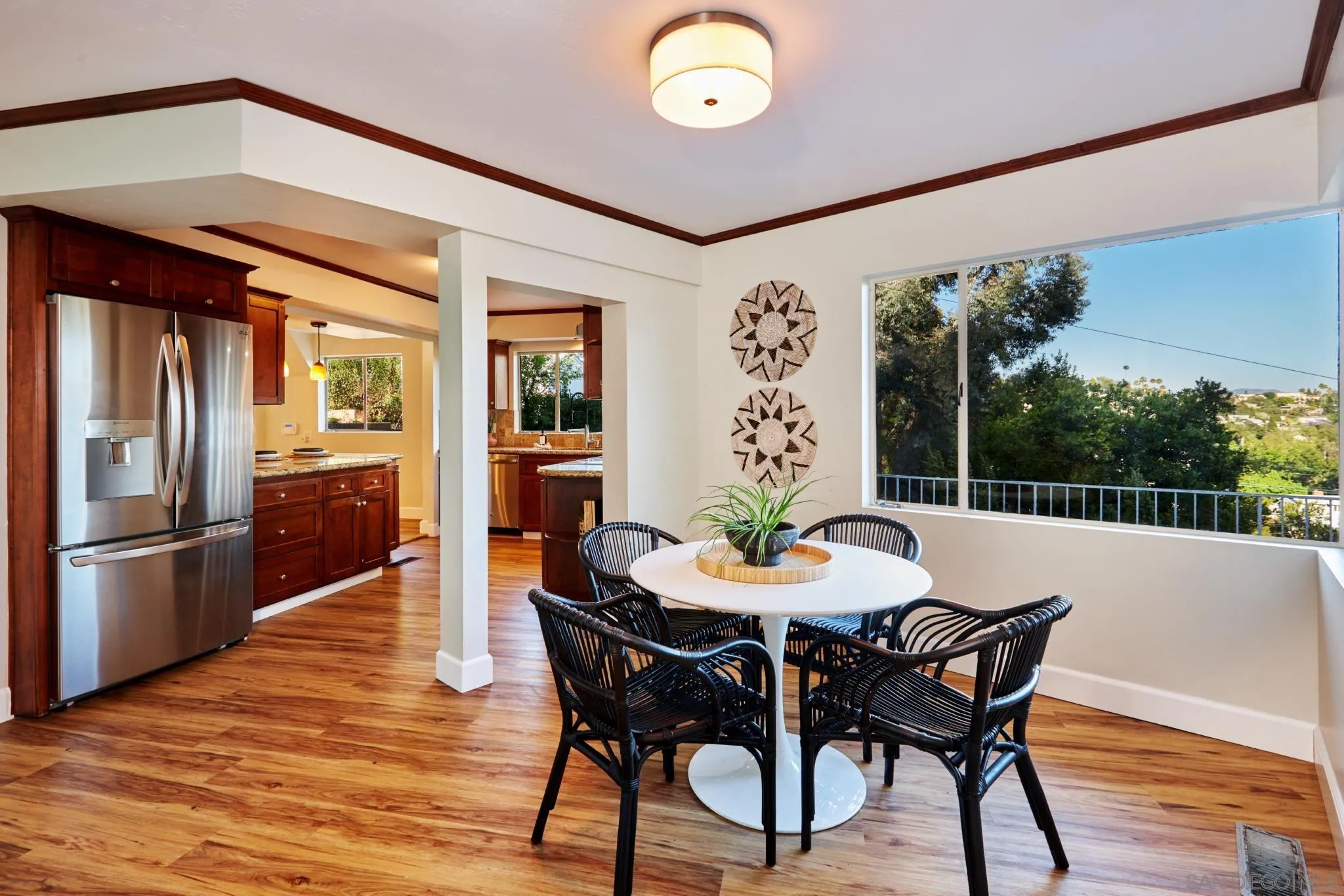 9080 Terrace Drive La Mesa, CA 91941 - Photo 13 of 25 a view of a dining room with furniture window and wooden floor