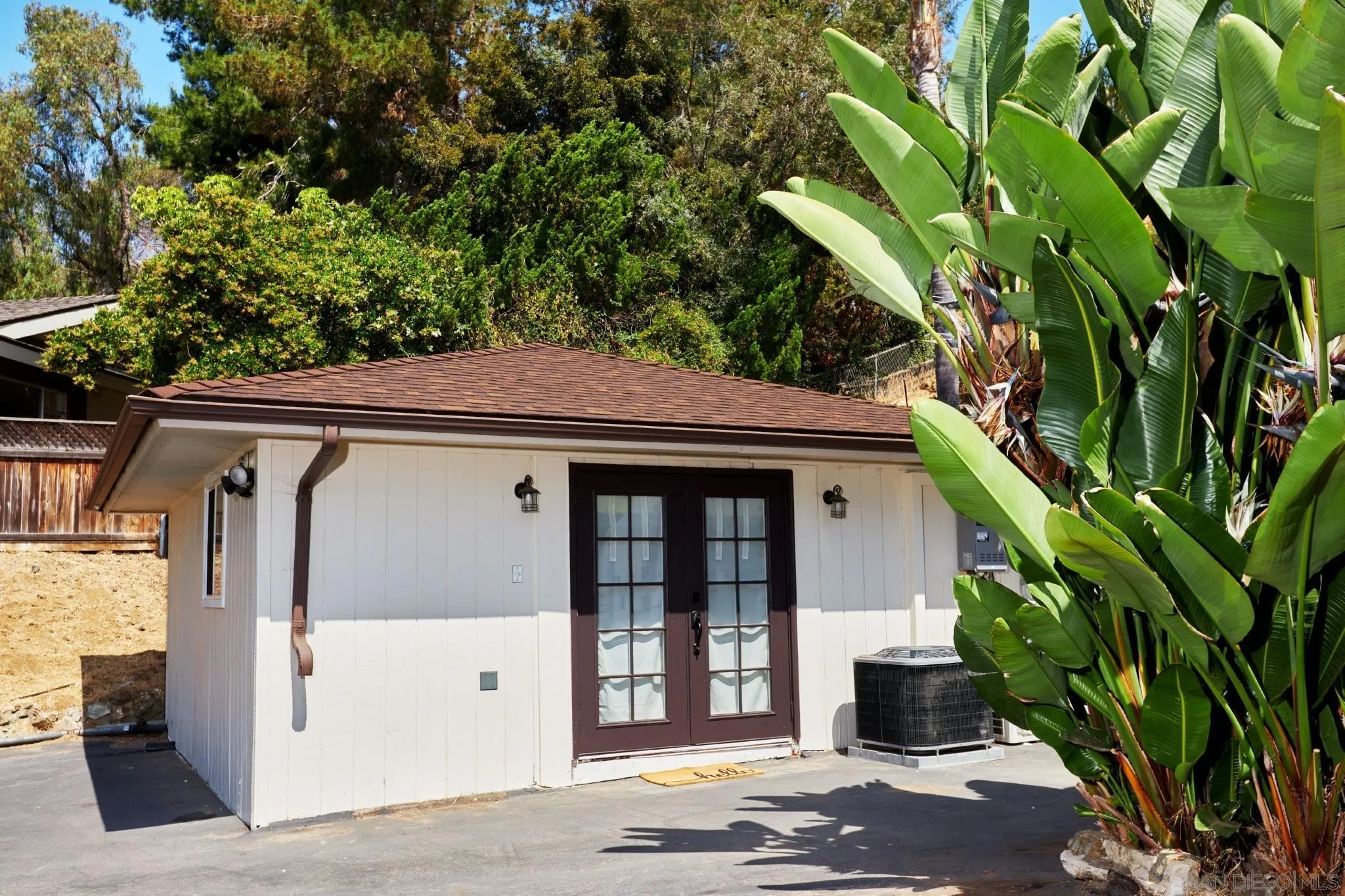 9080 Terrace Drive La Mesa, CA 91941 - Photo 20 of 25 a view of a house with a tree