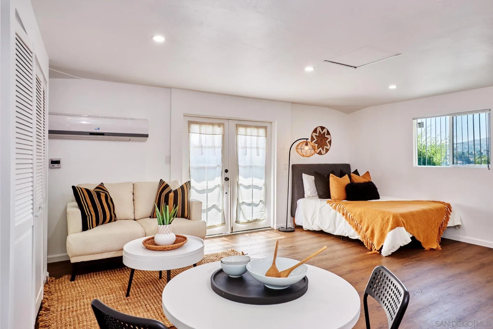 9080 Terrace Drive La Mesa, CA 91941 - Photo 21 of 25 a living room with furniture and a wooden floor