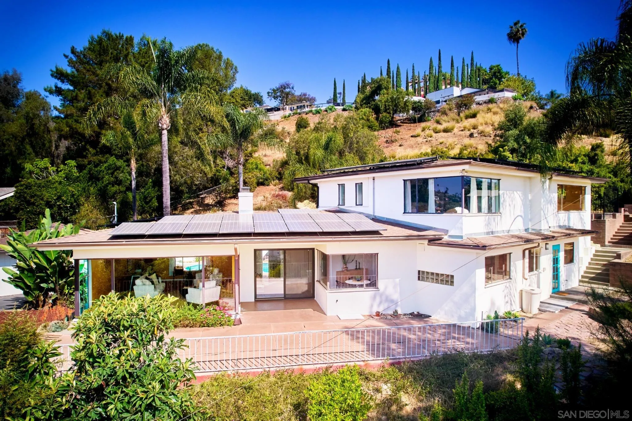 9080 Terrace Drive La Mesa, CA 91941 - Photo 5 of 25 a front view of a house with a yard
