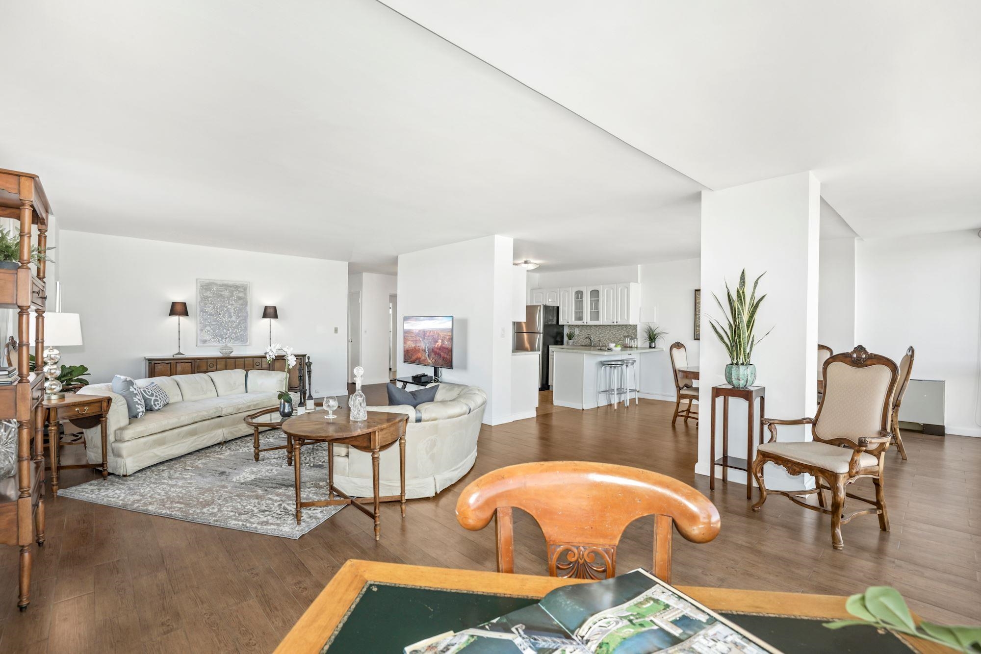 380 Mountain Road, Unit 704 Union City, NJ 07087 - Photo 11 of 21 a living room with furniture and wooden floor