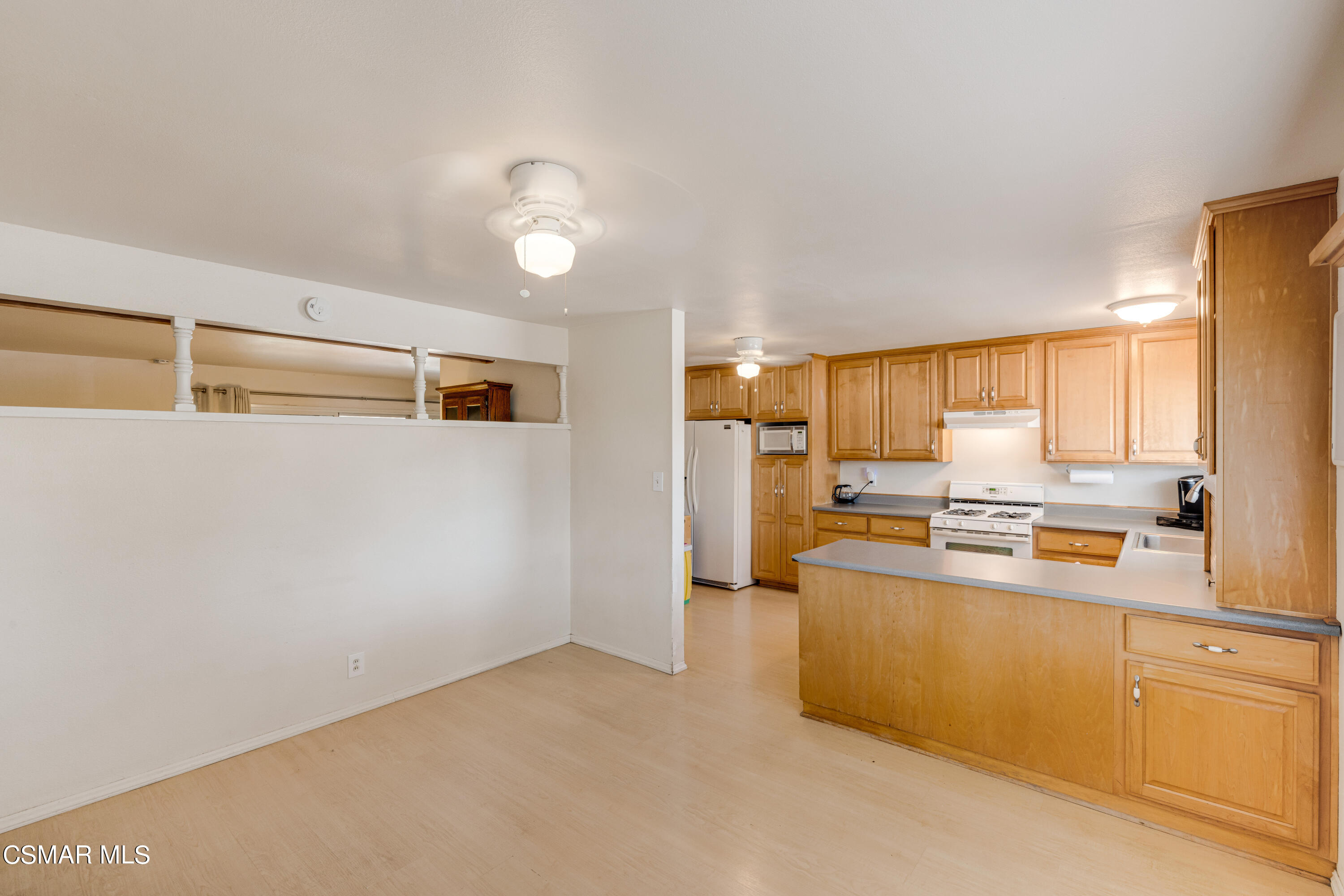 3379 Weatherford Court Simi Valley, CA 93063 - Photo 21 of 39 a kitchen with cabinets a sink and appliances