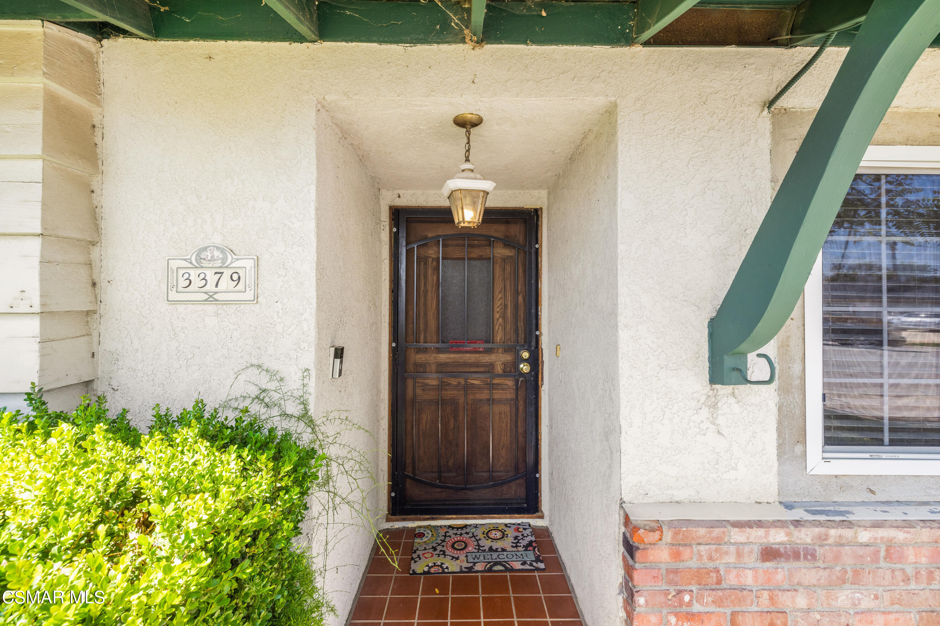 3379 Weatherford Court Simi Valley, CA 93063 - Photo 3 of 39 a front view of a house with a entryway