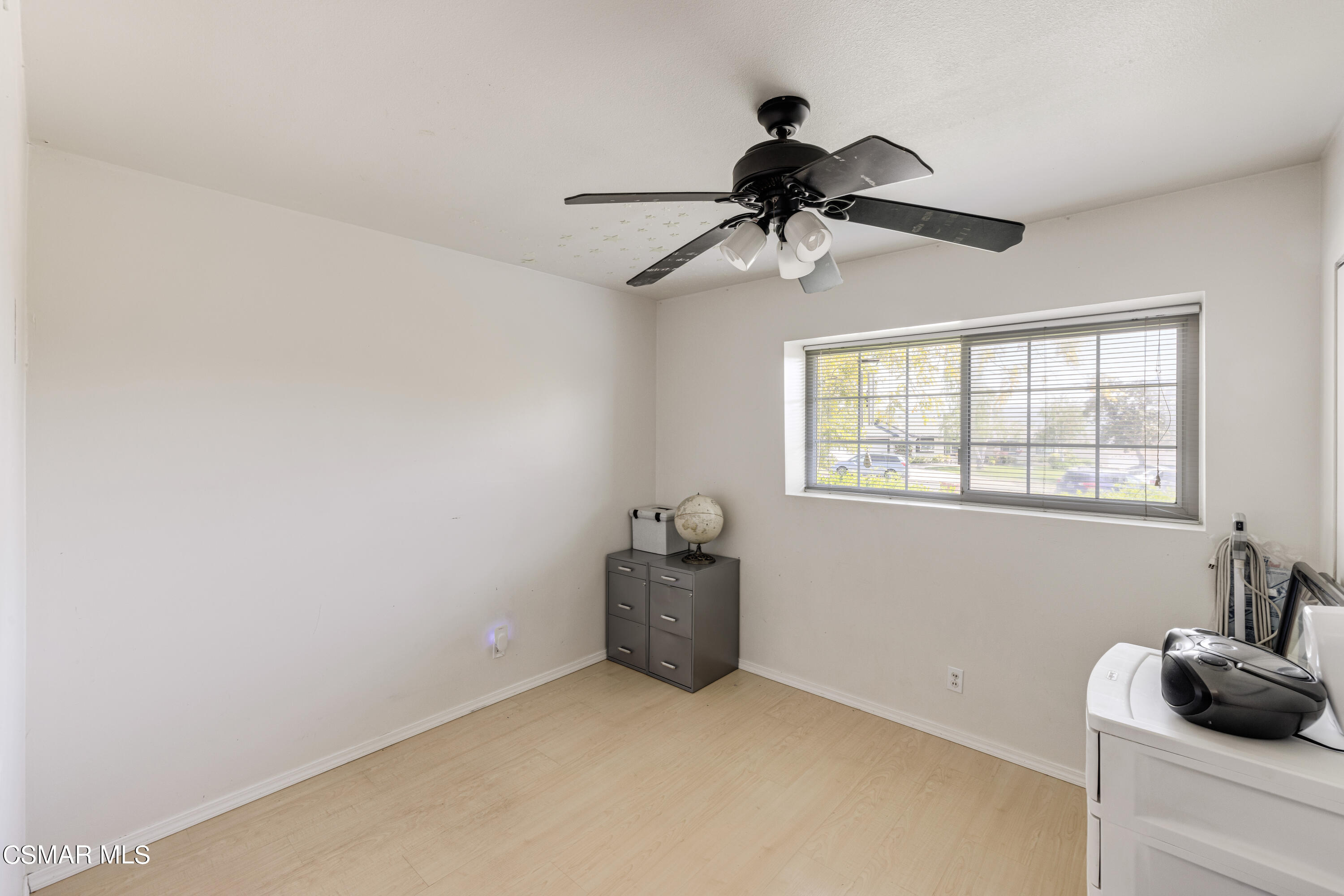 3379 Weatherford Court Simi Valley, CA 93063 - Photo 33 of 39 a kitchen with a window and a fan