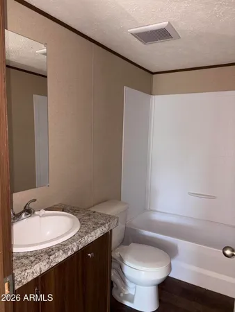 a view of small space with empty racks on the wall