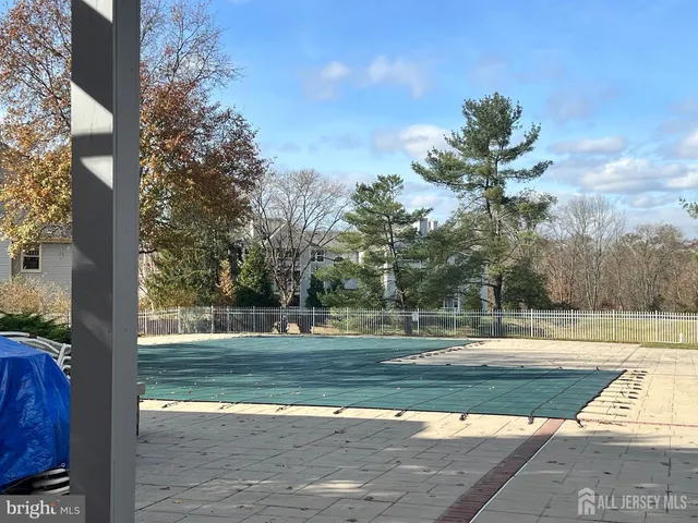 a view of a kitchen cabinets and a wooden floor
