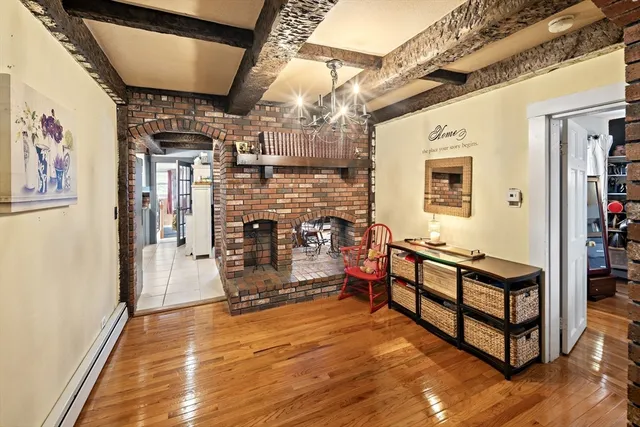 a kitchen with a stove a sink and a refrigerator